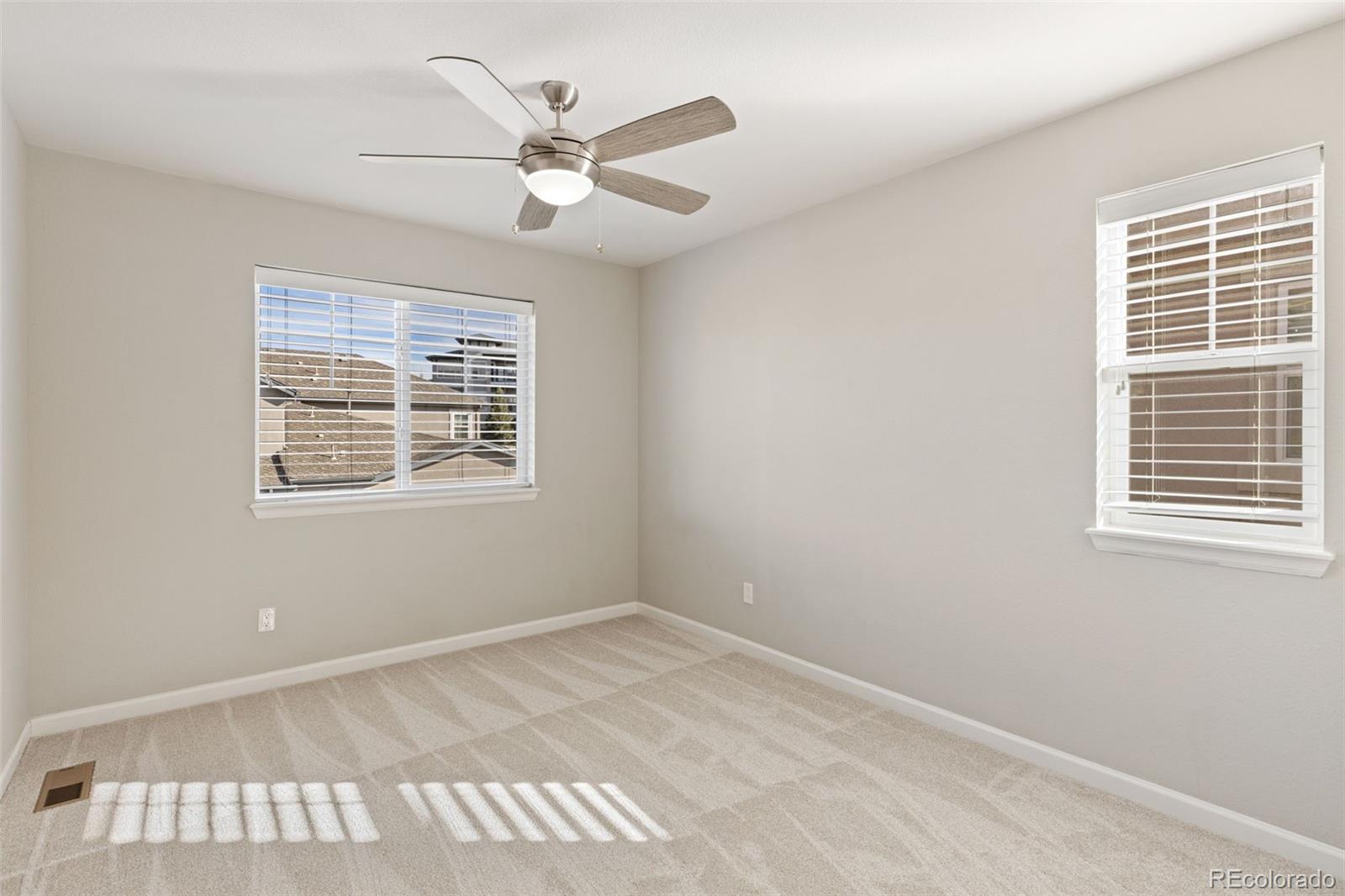 1338 Promontory Bluff View Colorado Springs, CO 80921 - Photo 20 of 28 a view of an empty room with a window