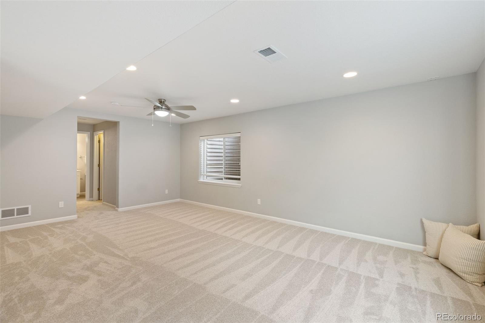 1338 Promontory Bluff View Colorado Springs, CO 80921 - Photo 22 of 28 a view of an empty room with a window