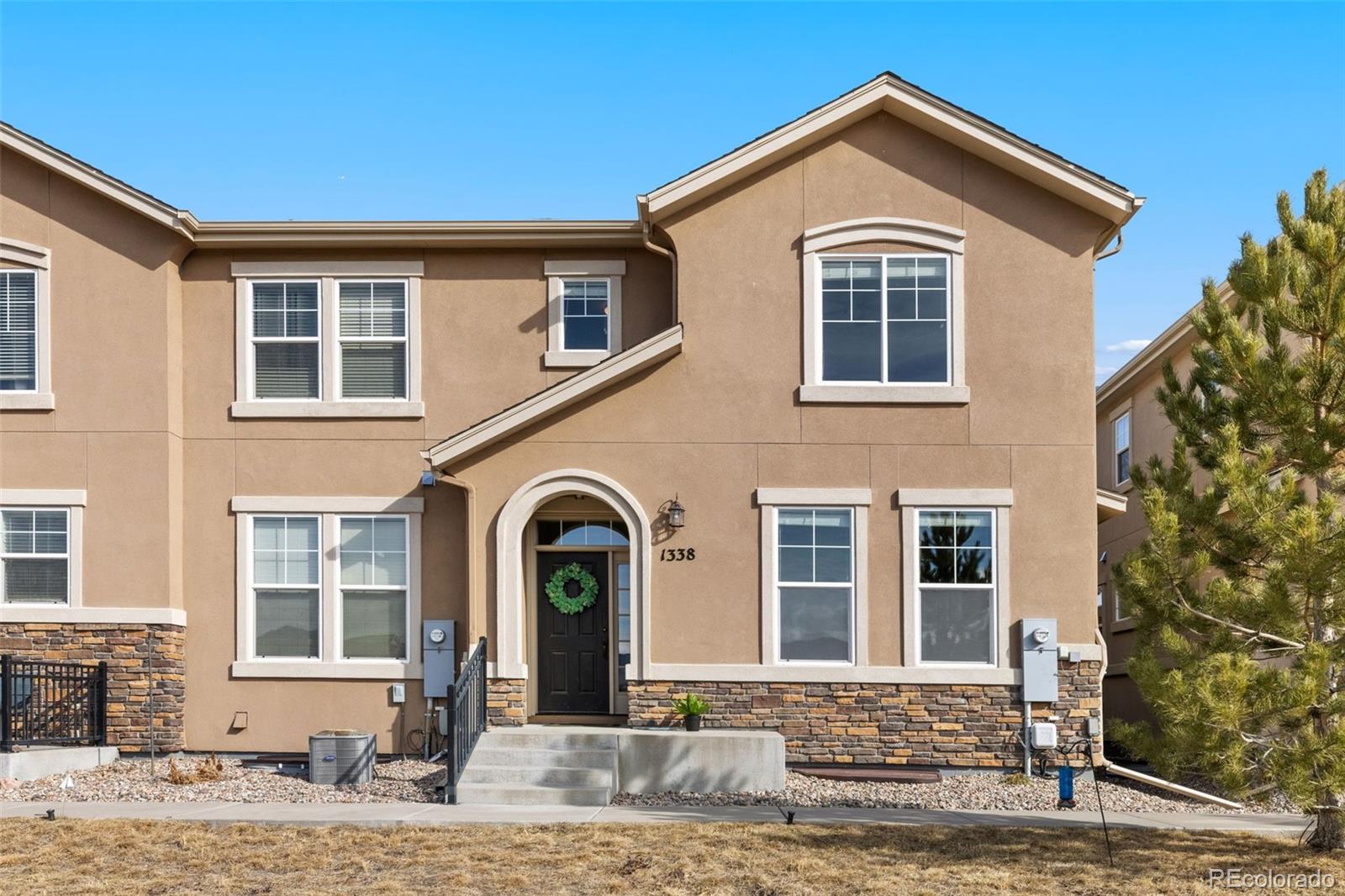 1338 Promontory Bluff View Colorado Springs, CO 80921 - Photo 28 of 28 a front view of a house