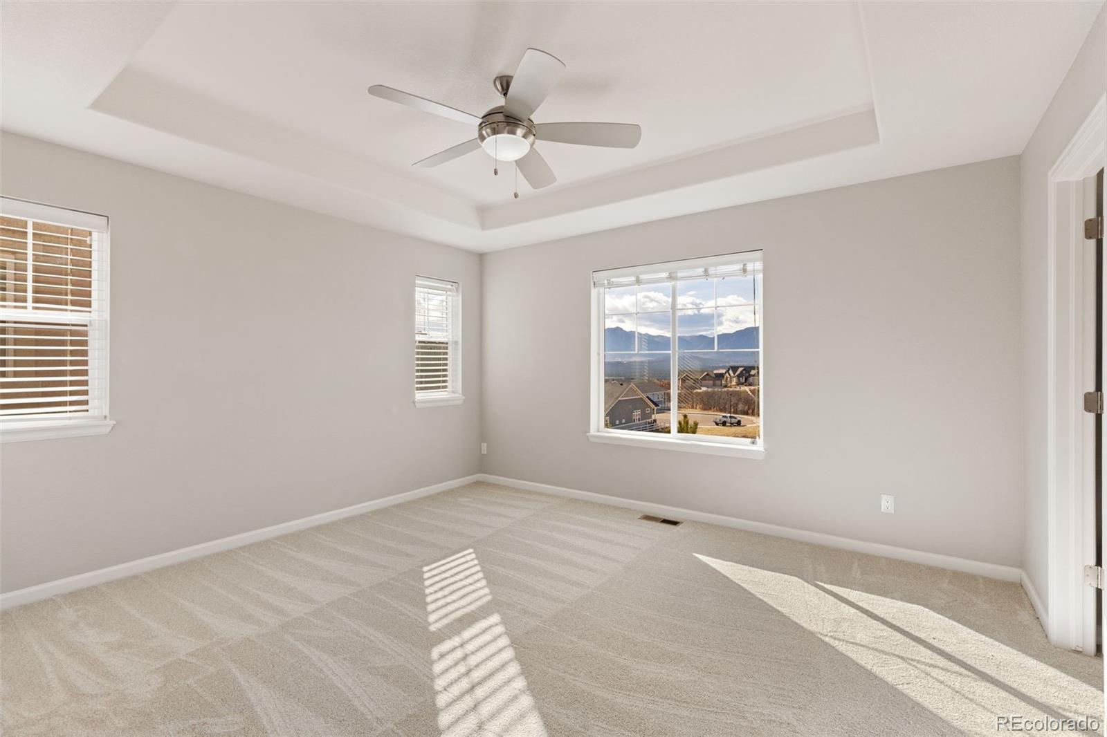 1338 Promontory Bluff View Colorado Springs, CO 80921 - Photo 5 of 28 a view of an empty room with a window