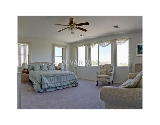 832 Bluff Ridge Avenue Henderson, NV 89012 - Photo 13 of 20 Master Bedroom.
