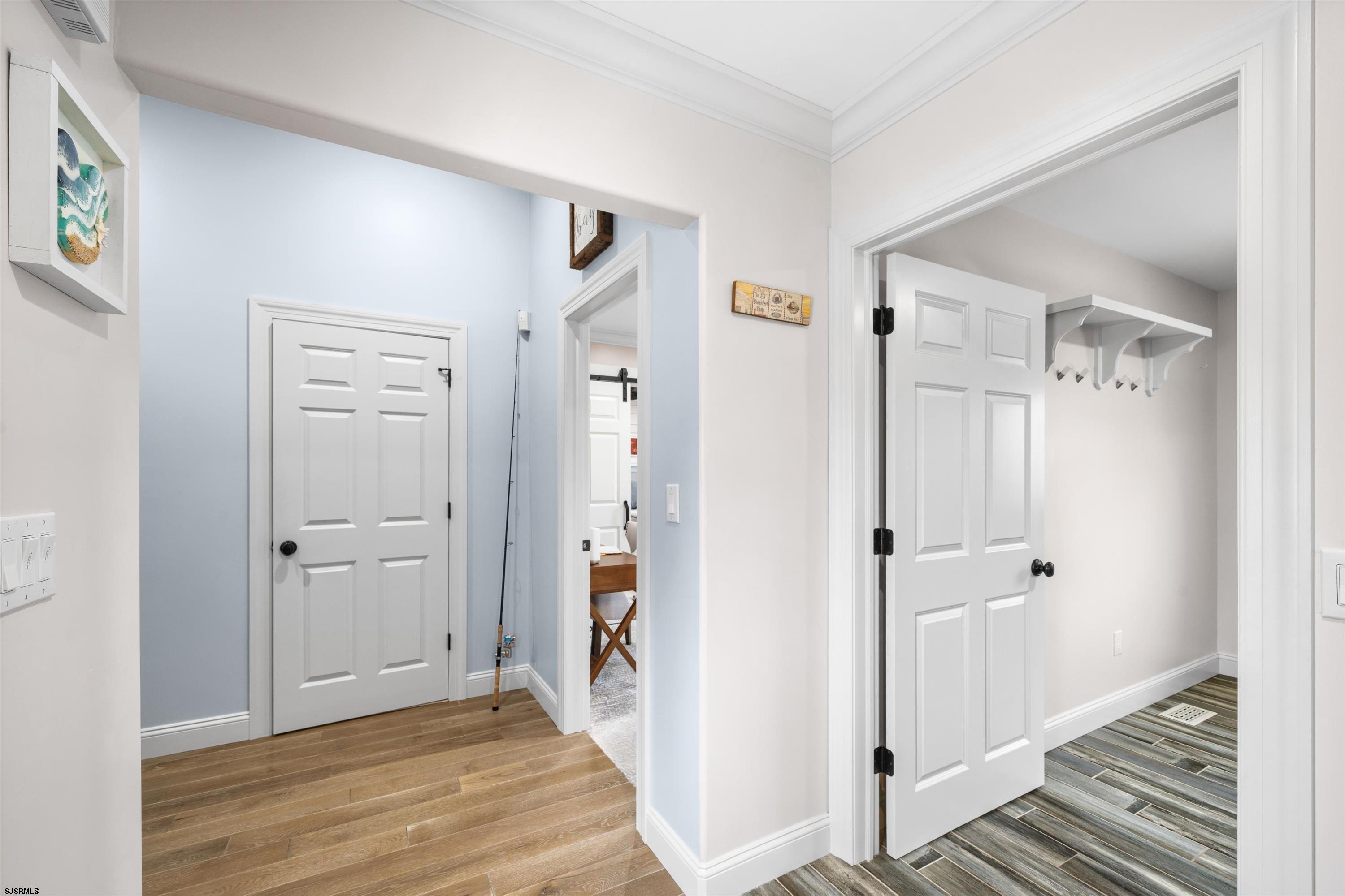 33 Harbor Lane Somers Point, NJ 08244 - Photo 17 of 70 a view of a hallway with wooden floor and closet area