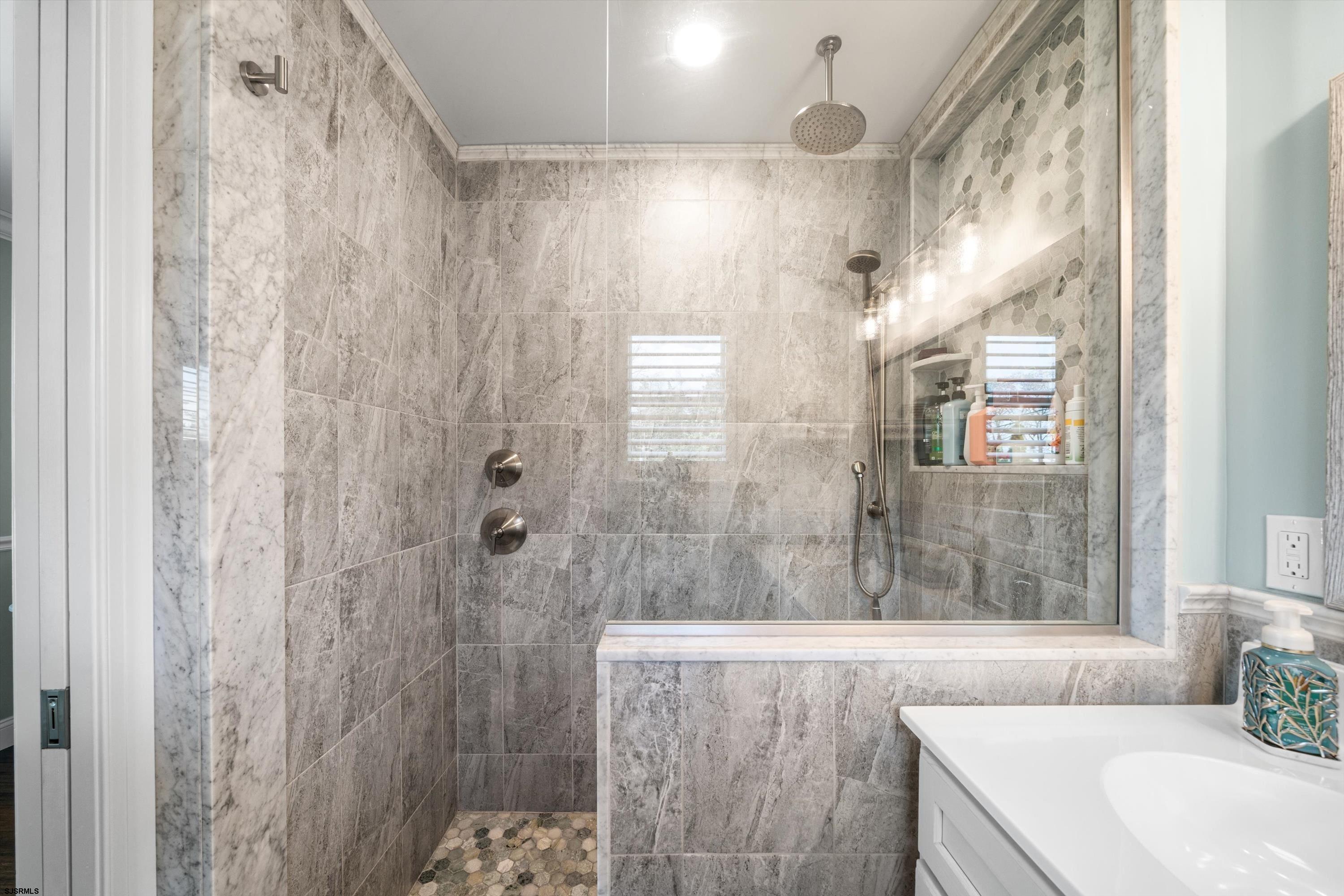 33 Harbor Lane Somers Point, NJ 08244 - Photo 23 of 70 a bathroom with a bathtub and shower