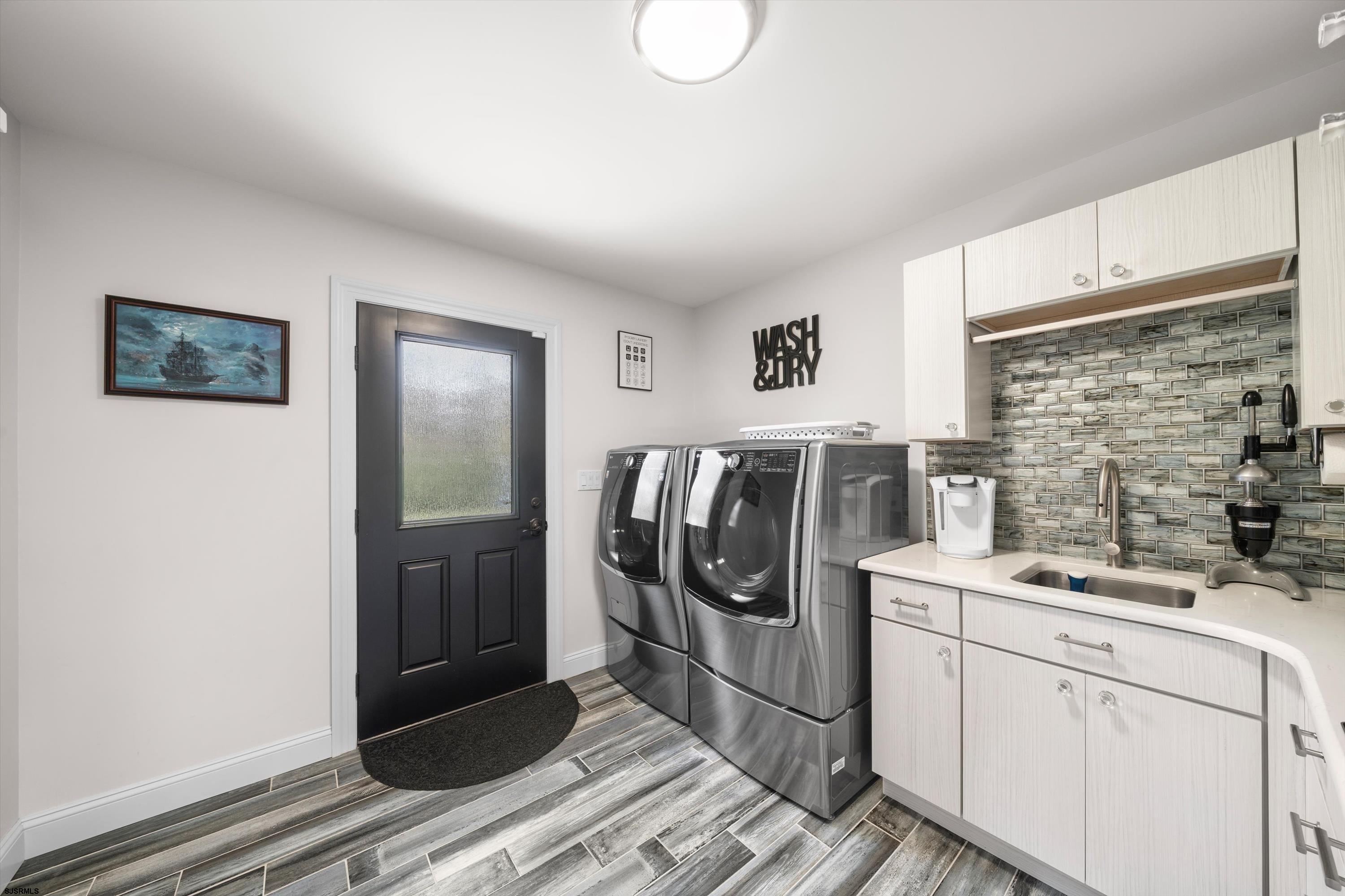 33 Harbor Lane Somers Point, NJ 08244 - Photo 25 of 70 a utility room with cabinets