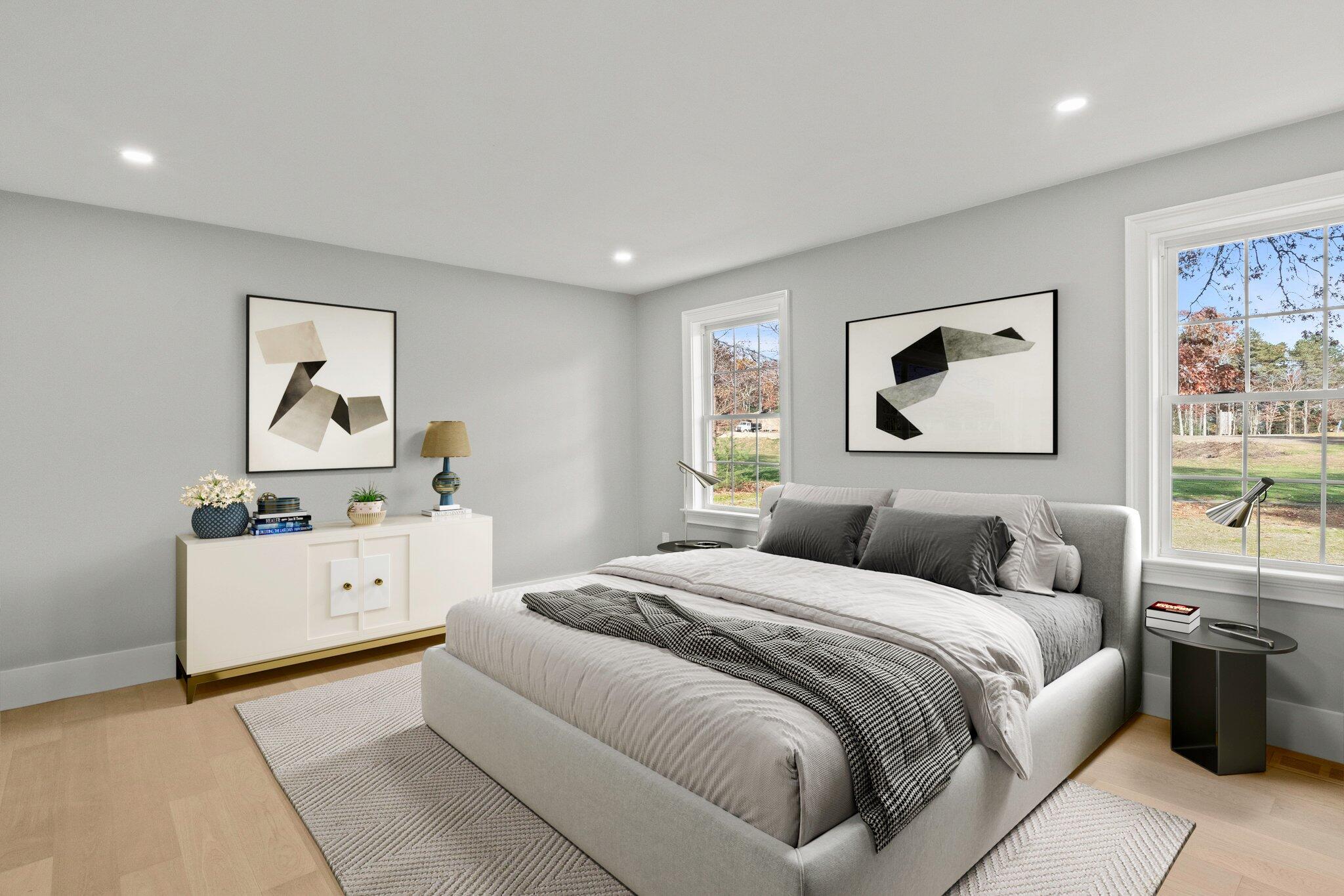 197 Old Barnstable Road Mashpee, MA 02649 - Photo 26 of 50 a bedroom with a large bed and painting on the wall