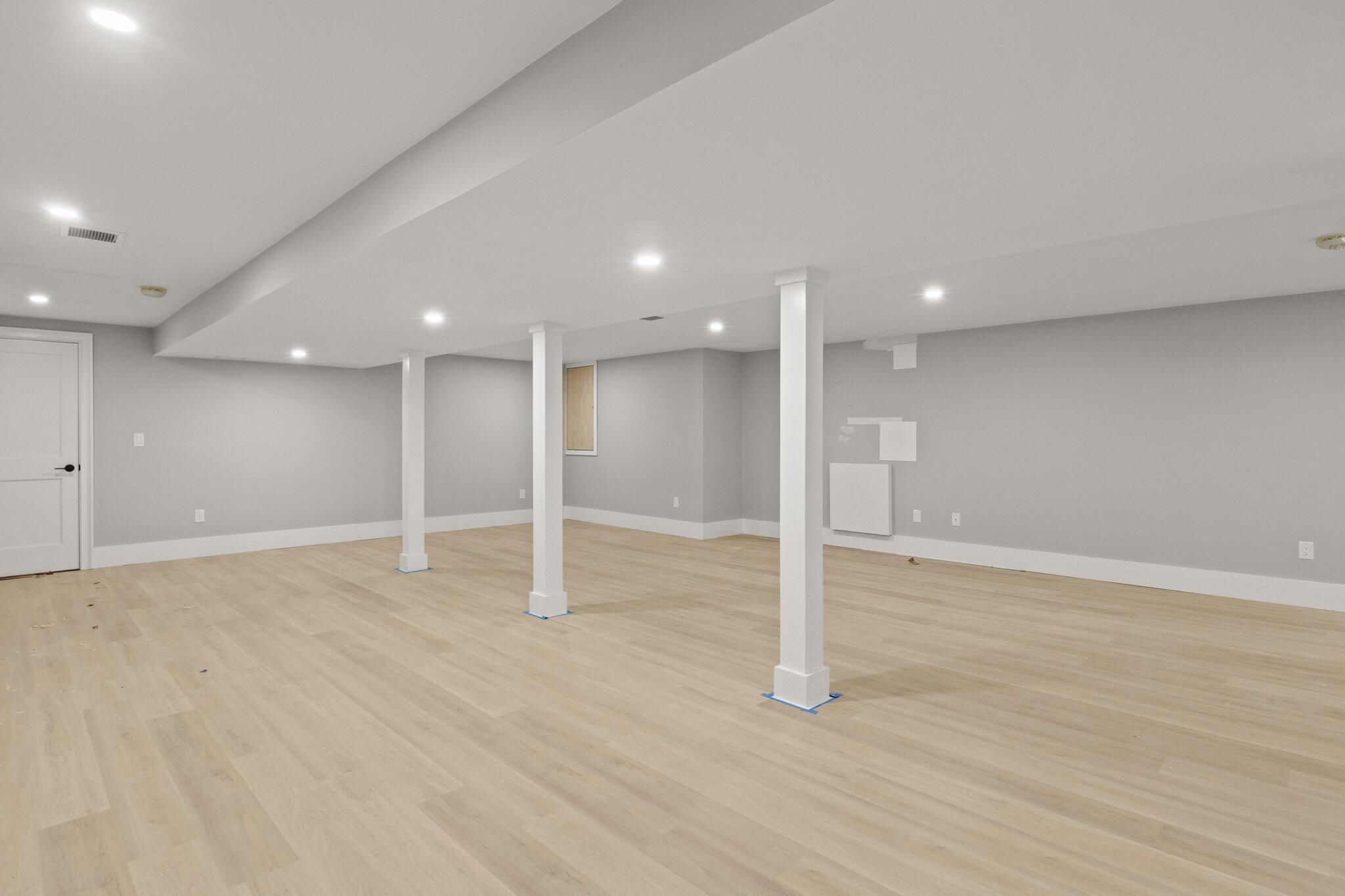 197 Old Barnstable Road Mashpee, MA 02649 - Photo 46 of 50 a view of an empty room with wooden floor