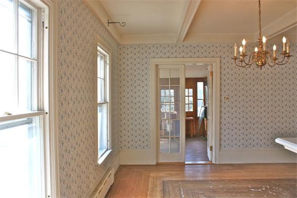 189 Highland Road Tiverton, RI 02878 - Photo 12 of 25 a view of a livingroom with dining room