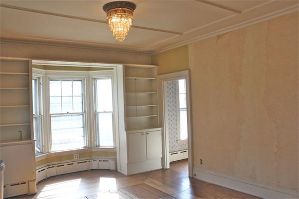 189 Highland Road Tiverton, RI 02878 - Photo 13 of 25 a view of empty room with wooden floor and fan