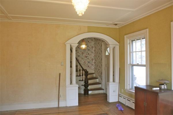 189 Highland Road Tiverton, RI 02878 - Photo 14 of 25 a view of entryway with wooden floor and stairs