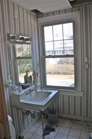 189 Highland Road Tiverton, RI 02878 - Photo 17 of 25 a view of a dining room with furniture window and outside view
