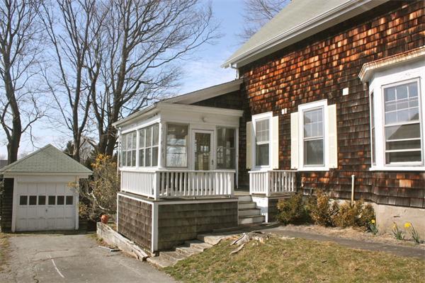 189 Highland Road Tiverton, RI 02878 - Photo 2 of 25 a front view of a house with a yard