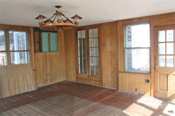 189 Highland Road Tiverton, RI 02878 - Photo 7 of 25 a view of a windows and entrance