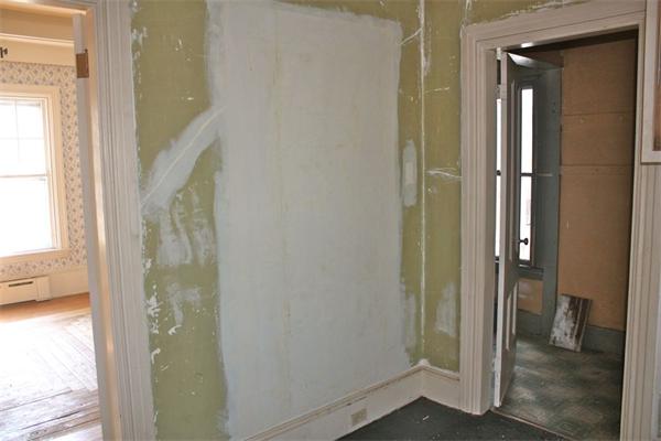189 Highland Road Tiverton, RI 02878 - Photo 10 of 25 a view of a bathroom from a hallway