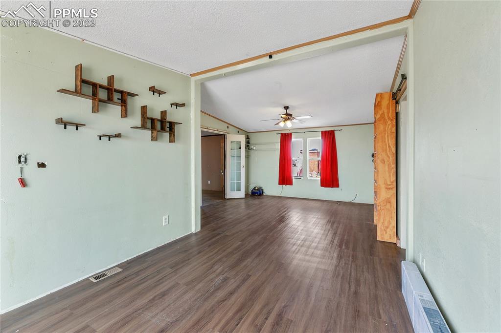 31995 North Neely Road Yoder, CO 80864 - Photo 14 of 46 a view of entryway with wooden floor