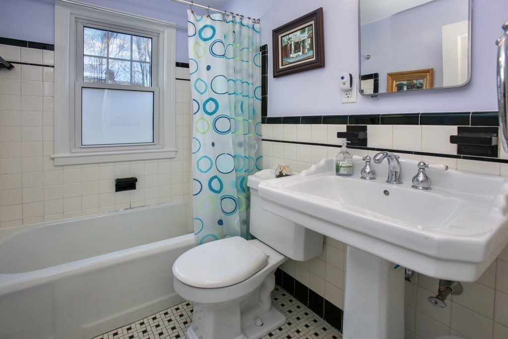 55 Bay State Road Arlington, MA 02474 - Photo 12 of 20 a bathroom with a sink toilet and bathtub