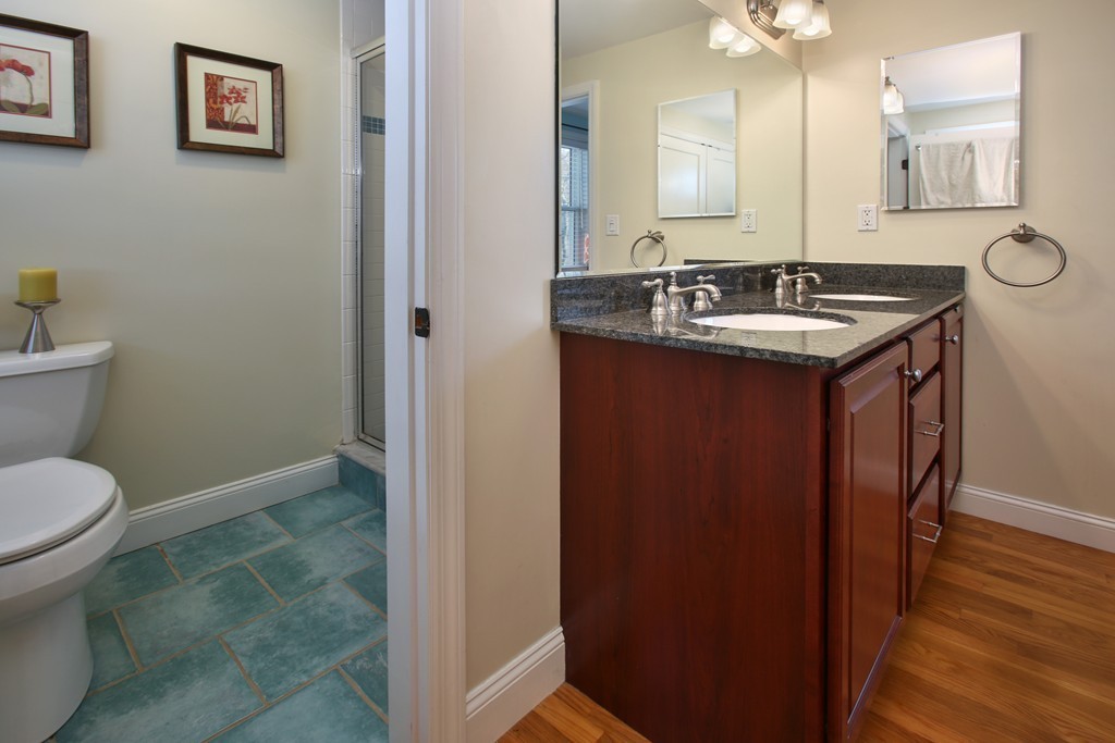 55 Bay State Road Arlington, MA 02474 - Photo 7 of 20 a bathroom with a sink and a toilet