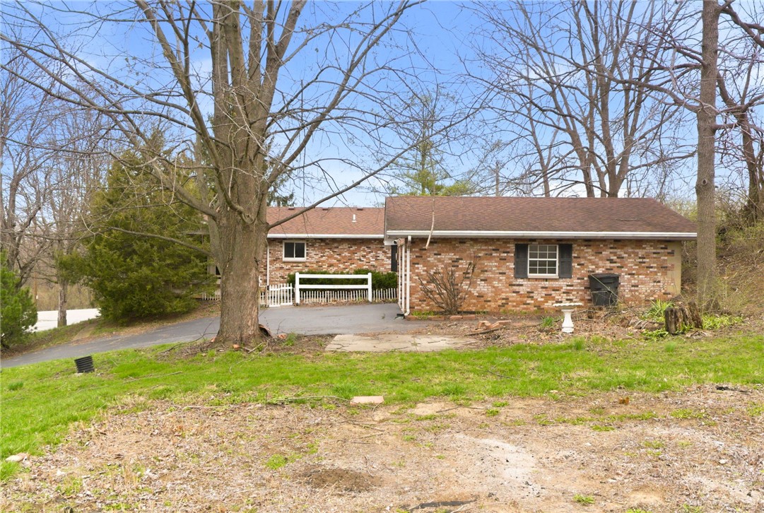 6711 Hamilton-Middletown Road Franklin, OH 45005 - Photo 30 of 49 This brick residence offers a tranquil setting with ample outdoor space.