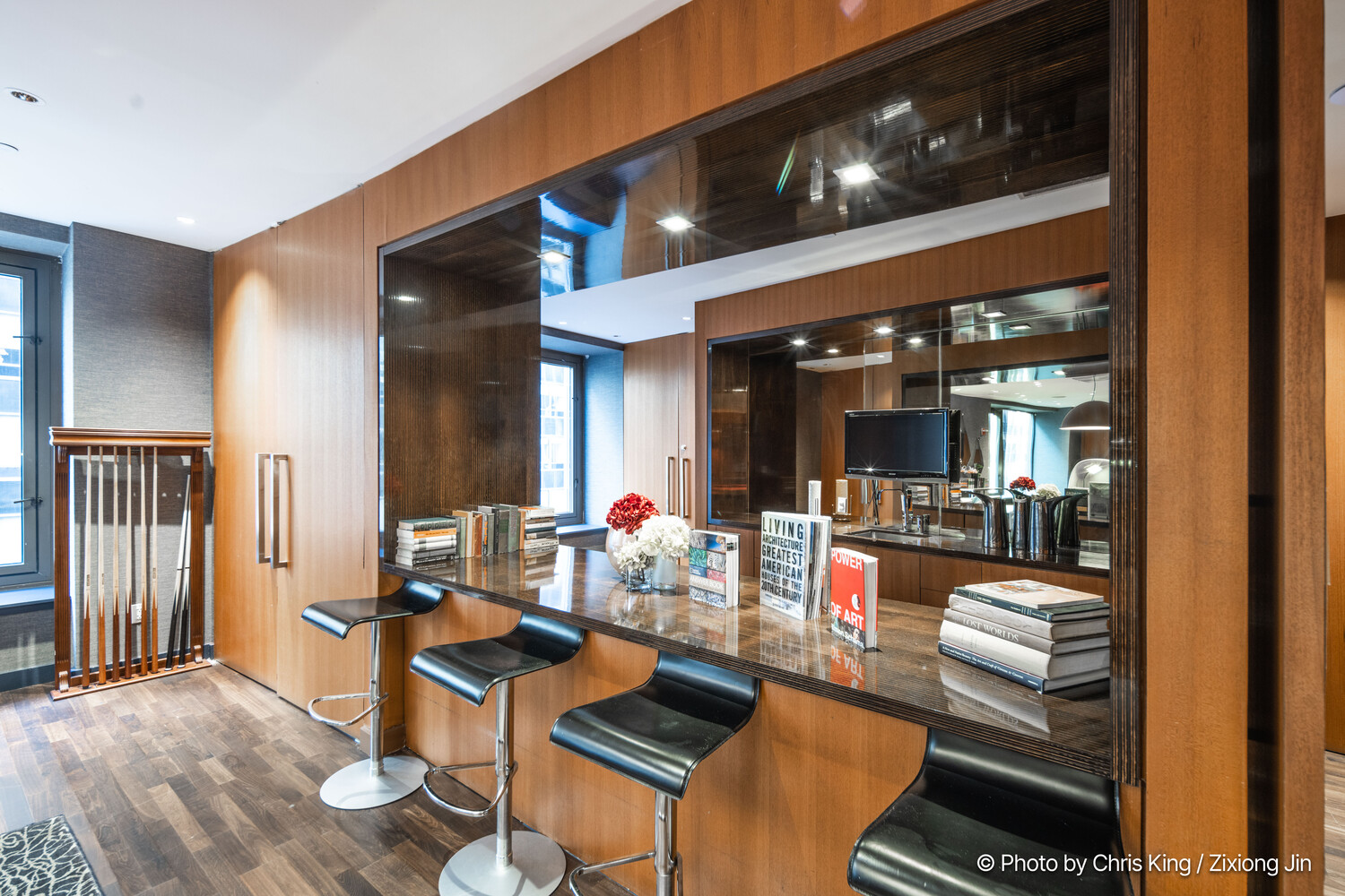 75 Wall Street, Unit 34C Manhattan, NY 10005 - Photo 20 of 26 a living room with furniture and a table