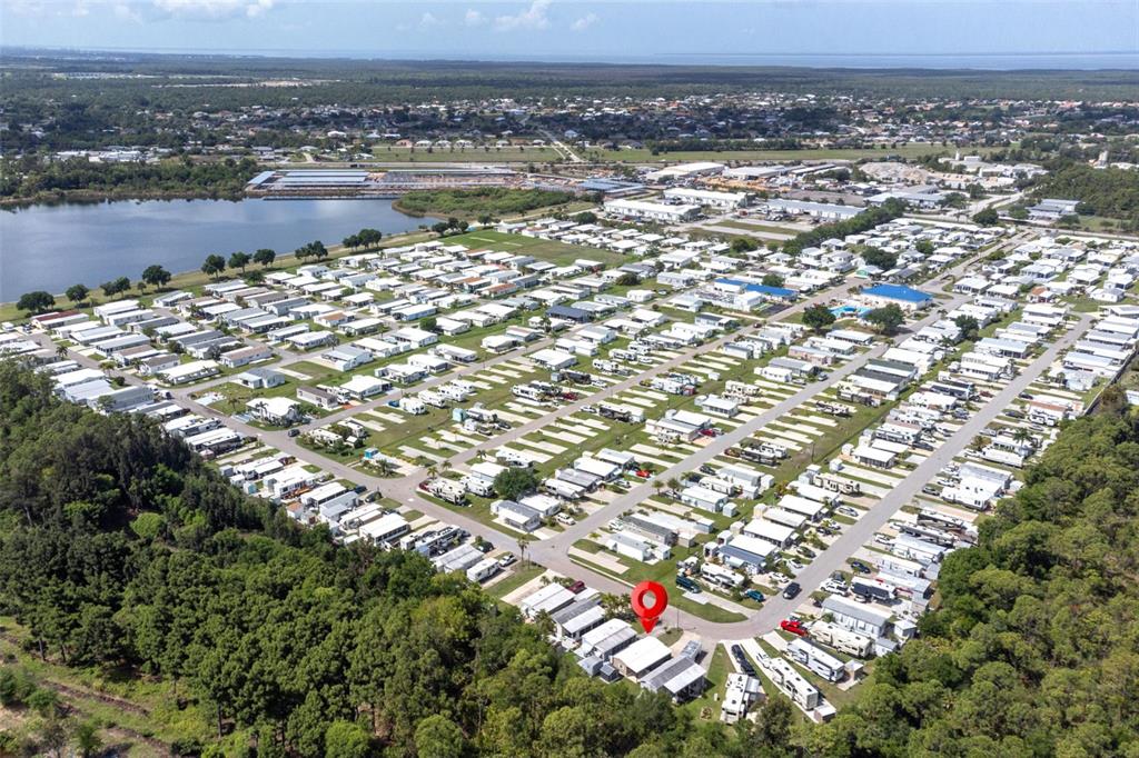 1703 North Manatee Loop Punta Gorda, FL 33950 - Photo 14 of 21 an aerial view of residential building and lake