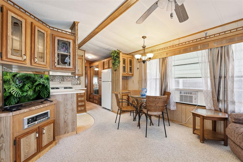 1703 North Manatee Loop Punta Gorda, FL 33950 - Photo 21 of 21 a dining room with furniture and large windows