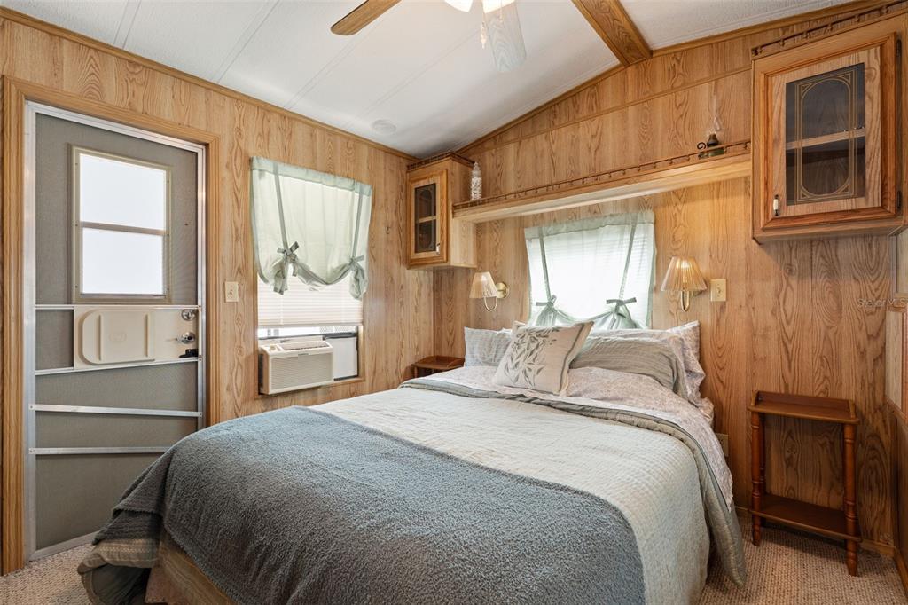 1703 North Manatee Loop Punta Gorda, FL 33950 - Photo 7 of 21 a bedroom with a bed and a window