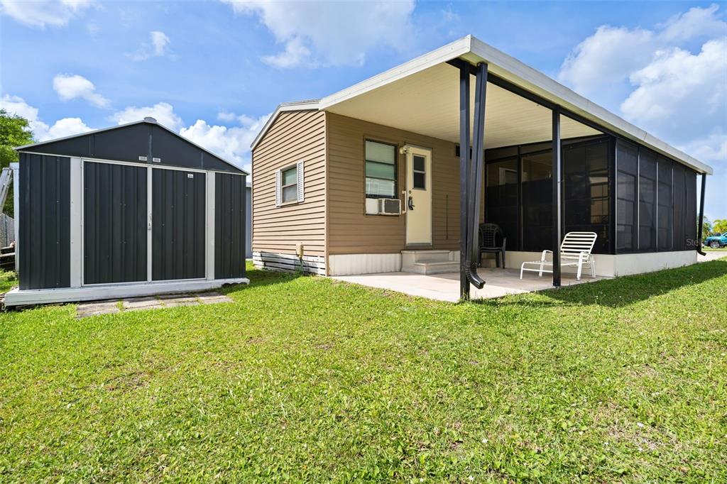 1703 North Manatee Loop Punta Gorda, FL 33950 - Photo 10 of 21 a view of a house with backyard and sitting area