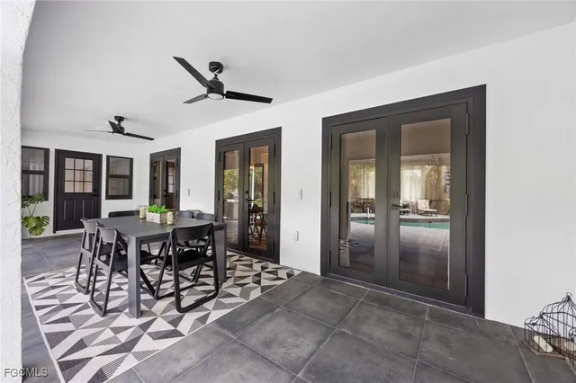 a view of swimming pool with a outdoor seating