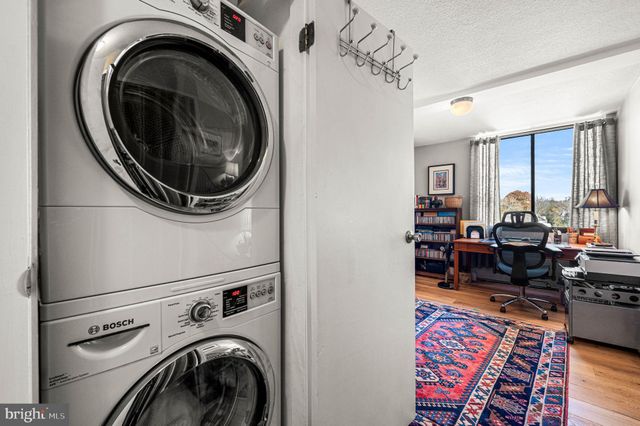a view of a living room and dining room
