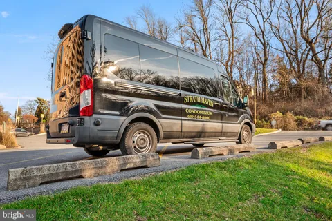 a view of a house with a back yard