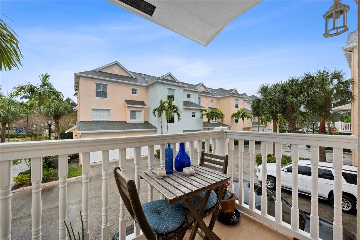 155 Galicia Way, Unit 202 Jupiter, FL 33458 - Photo 21 of 30 a view of a balcony with chairs