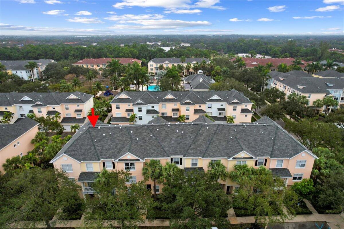 155 Galicia Way, Unit 202 Jupiter, FL 33458 - Photo 24 of 30 an aerial view of residential houses with outdoor space and street view