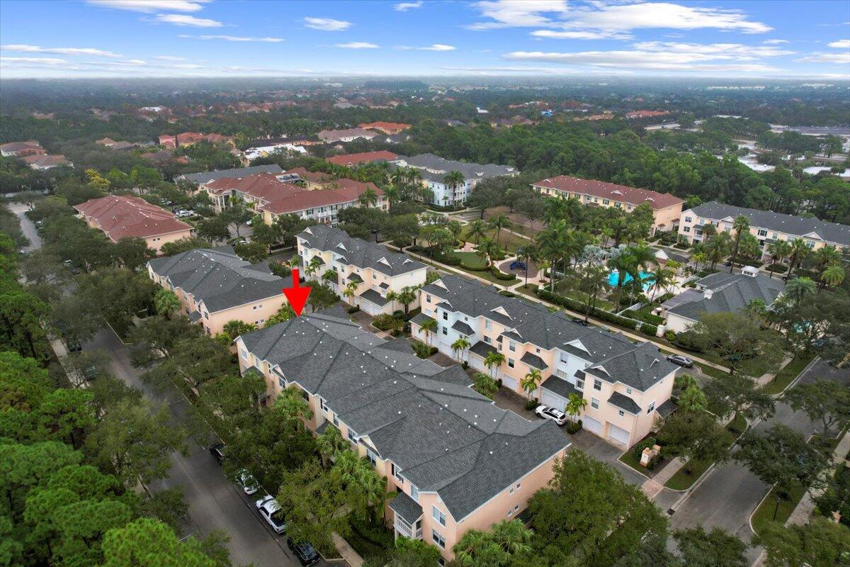155 Galicia Way, Unit 202 Jupiter, FL 33458 - Photo 25 of 30 an aerial view of residential houses with outdoor space