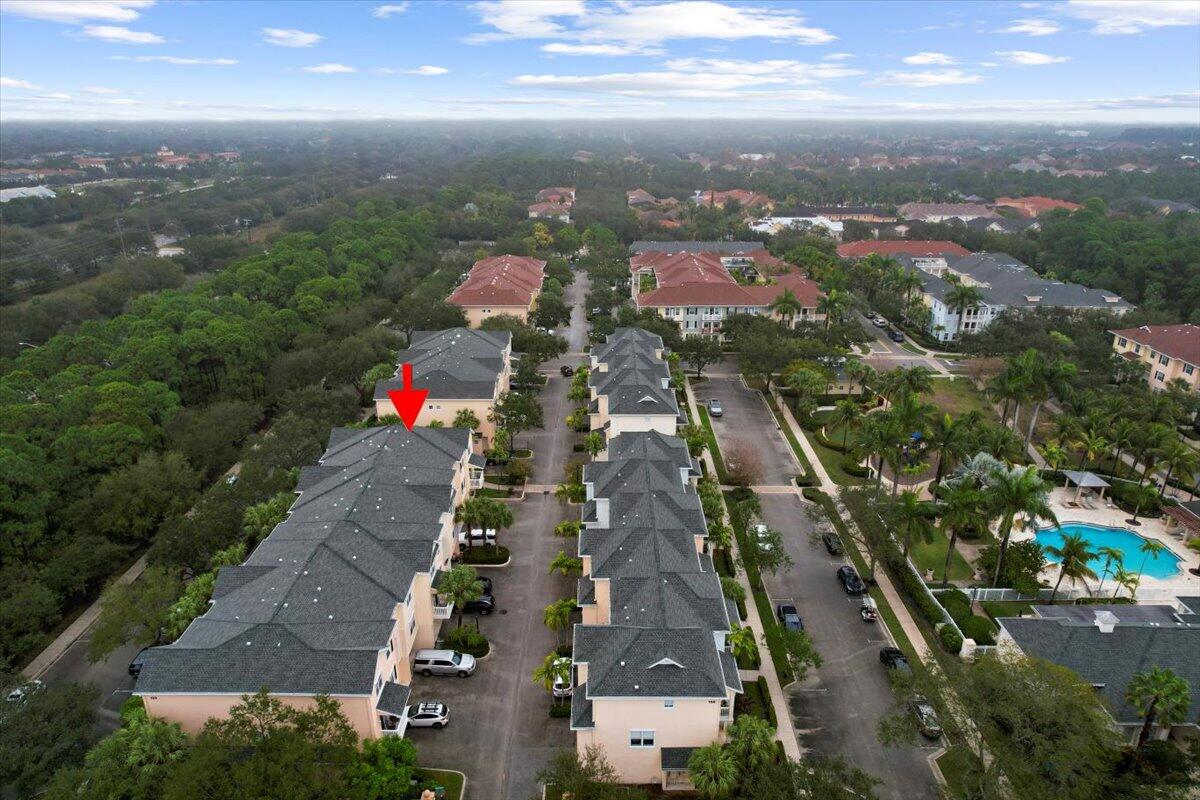 155 Galicia Way, Unit 202 Jupiter, FL 33458 - Photo 26 of 30 an aerial view of residential houses with outdoor space
