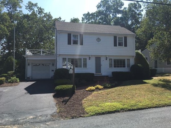 25 Arbor Road Chelmsford, MA 01863 - Photo 1 of 16 a front view of a house with yard