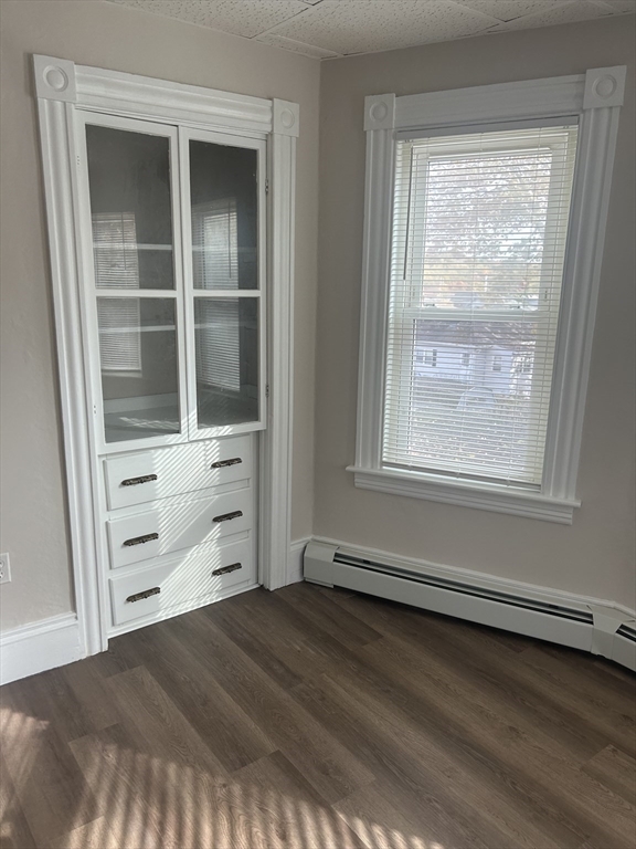 17 Abington Street, Unit 3 Worcester, MA 01603 - Photo 8 of 23 a view of a bedroom with cabinet and a window
