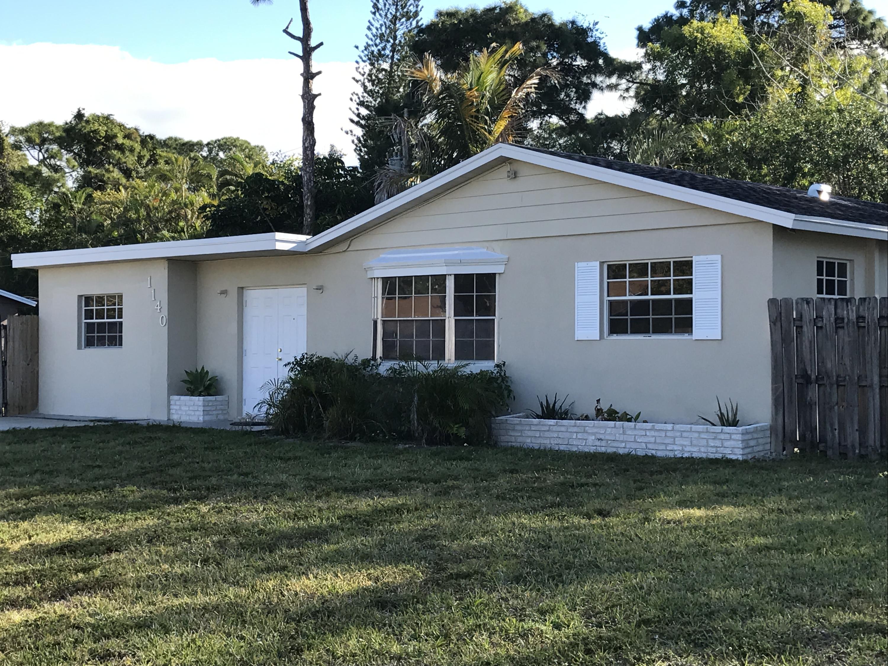 1140 Cheryl Road Haverhill, FL 33417 - Photo 1 of 19 FRONT