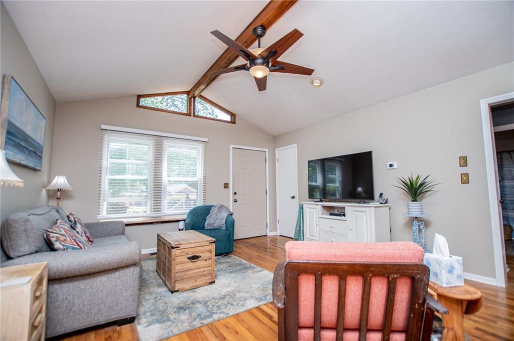 1385 Lakeview Parkway Villa Rica, GA 30180 - Photo 18 of 71 a bedroom with furniture a window and a flat screen tv