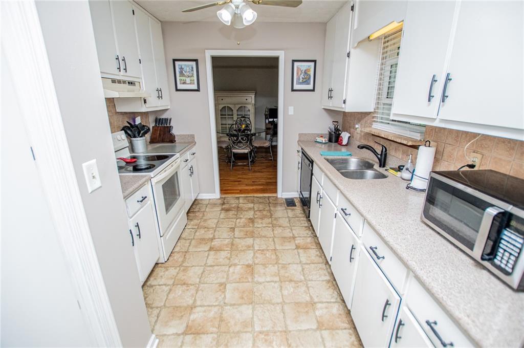 1385 Lakeview Parkway Villa Rica, GA 30180 - Photo 28 of 71 a kitchen with granite countertop lots of counter top space