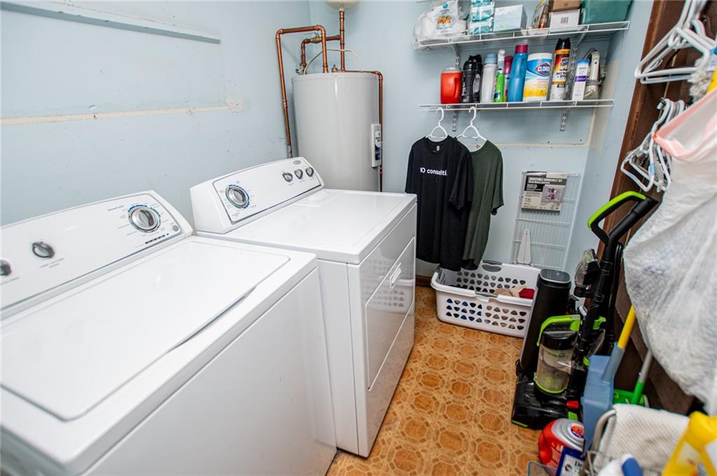 1385 Lakeview Parkway Villa Rica, GA 30180 - Photo 35 of 71 a utility room with dryer and washer