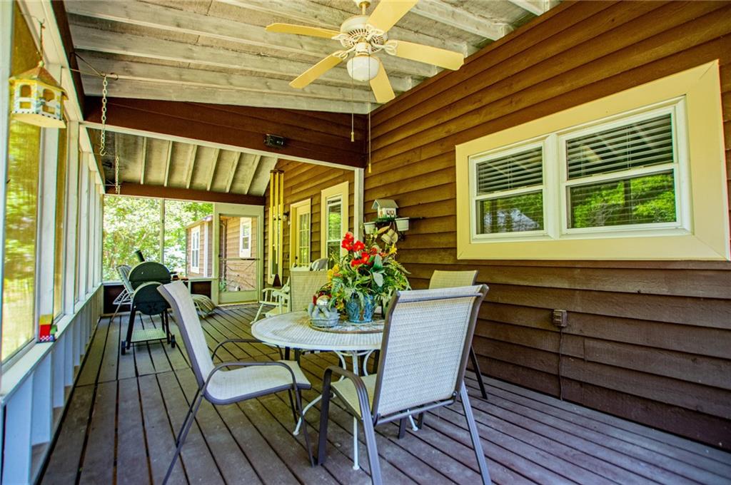1385 Lakeview Parkway Villa Rica, GA 30180 - Photo 55 of 71 a view of a dining room with furniture and wooden floor