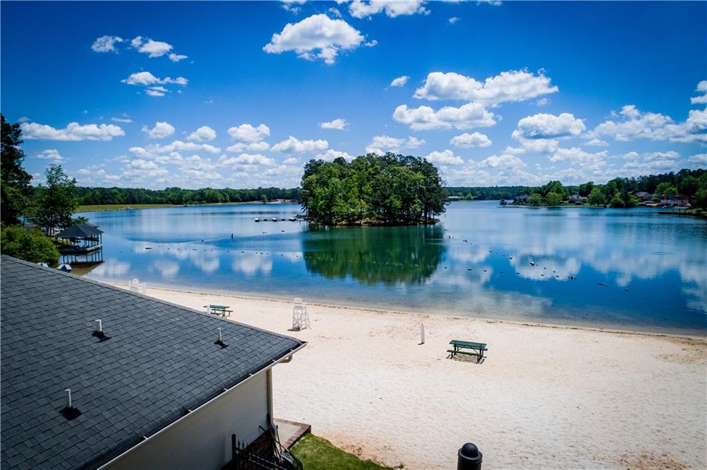 1385 Lakeview Parkway Villa Rica, GA 30180 - Photo 71 of 71 a view of a lake with a floor to ceiling window