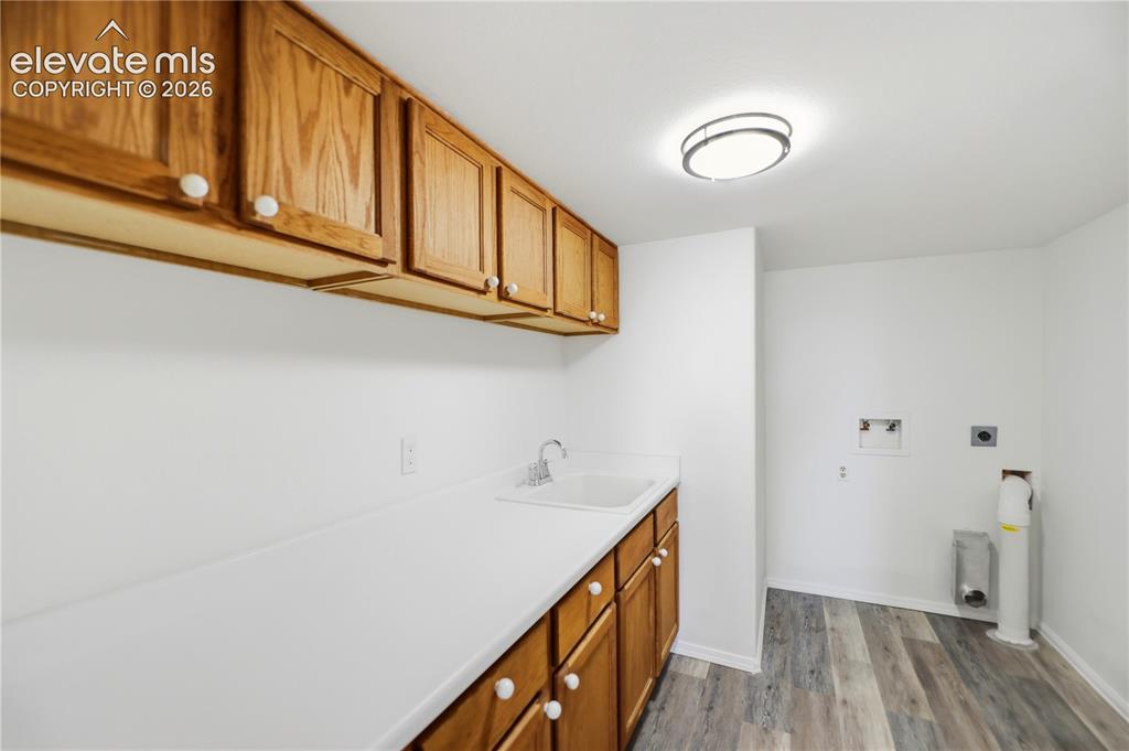 19027 Murphy Road Peyton, CO 80831 - Photo 27 of 48 Folding Space, Side By Side Space, Vinyl Plank