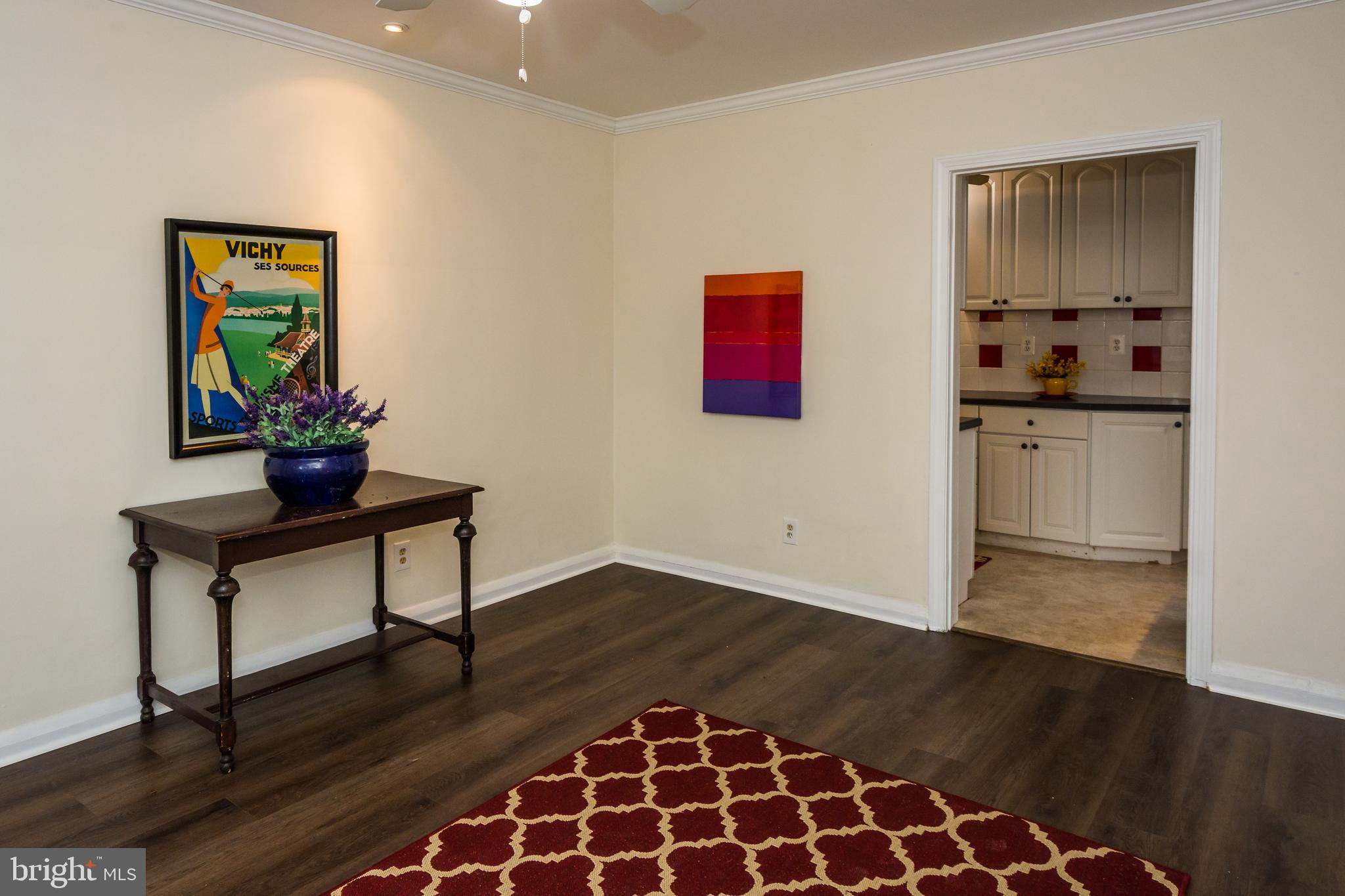 736 Warwick Road Baltimore, MD 21229 - Photo 6 of 54 Great Dining w recessed spots*planked laminate