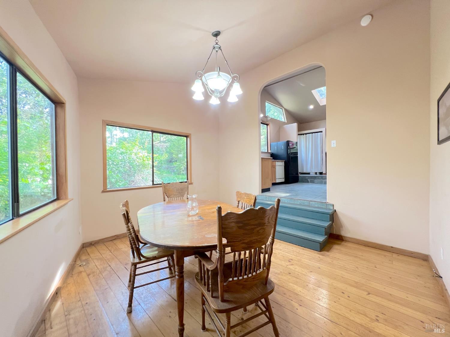 4000 Ridgewood Road Willits, CA 95490 - Photo 12 of 42 a view of a dining room with furniture window and wooden floor