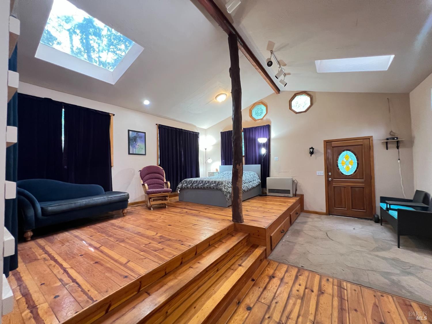 4000 Ridgewood Road Willits, CA 95490 - Photo 21 of 42 a living room with furniture and a wooden floor