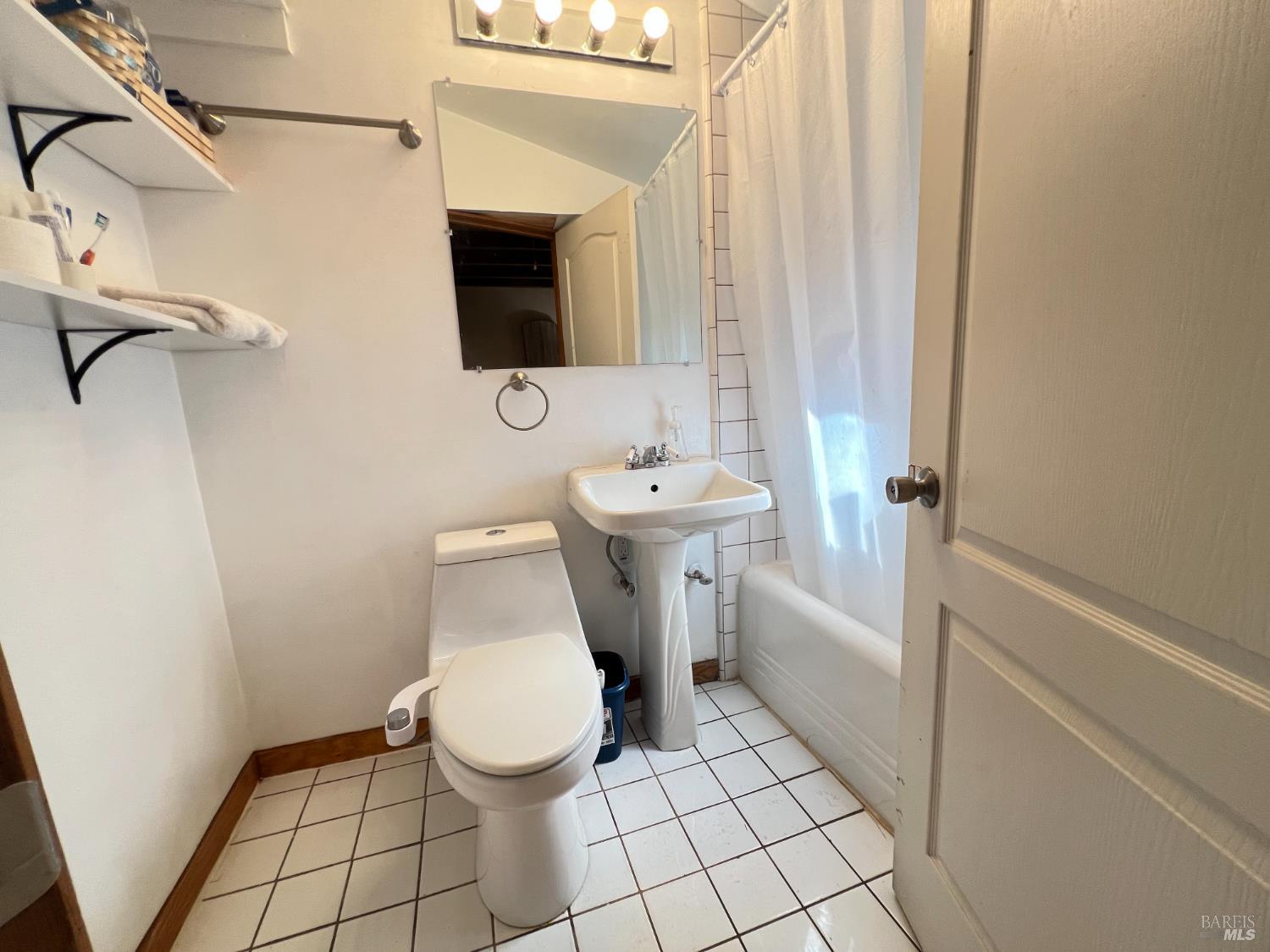 4000 Ridgewood Road Willits, CA 95490 - Photo 22 of 42 a bathroom with a sink toilet and shower