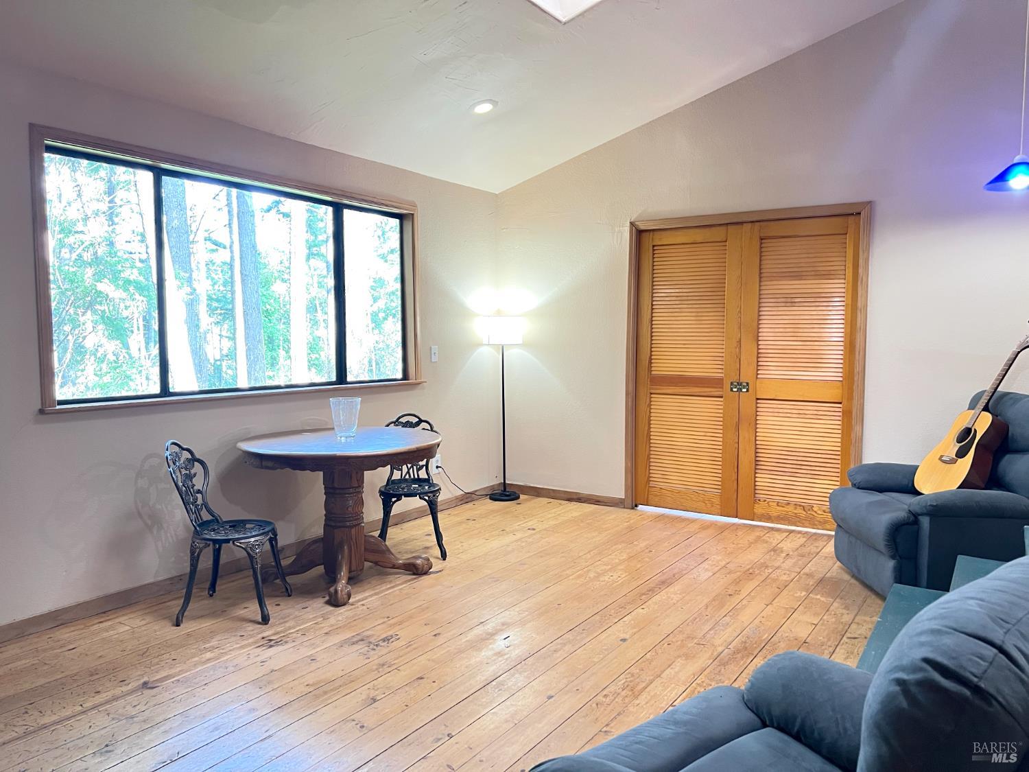 4000 Ridgewood Road Willits, CA 95490 - Photo 23 of 42 a living room with furniture and a window