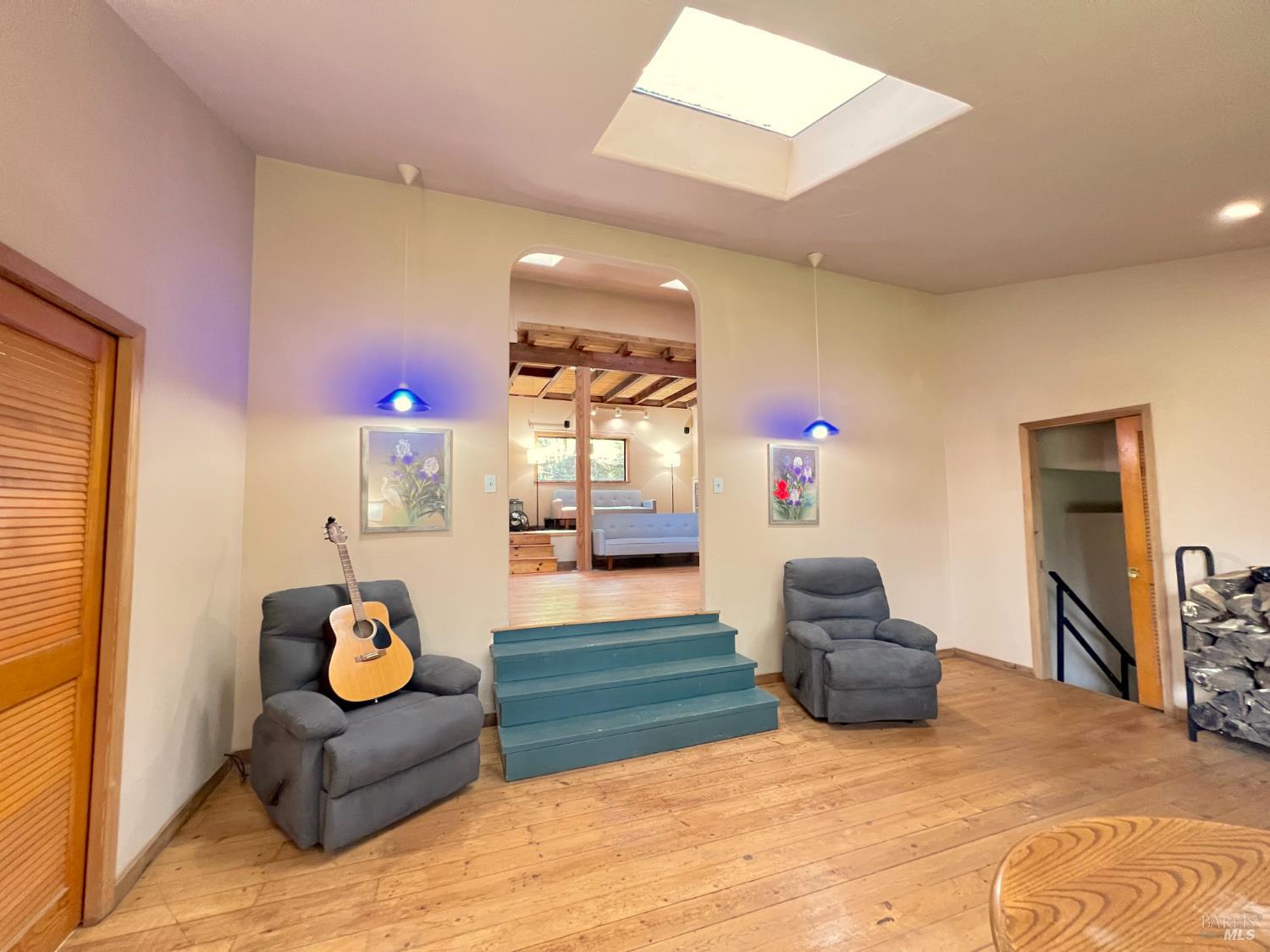 4000 Ridgewood Road Willits, CA 95490 - Photo 24 of 42 a living room with furniture and a flat screen tv