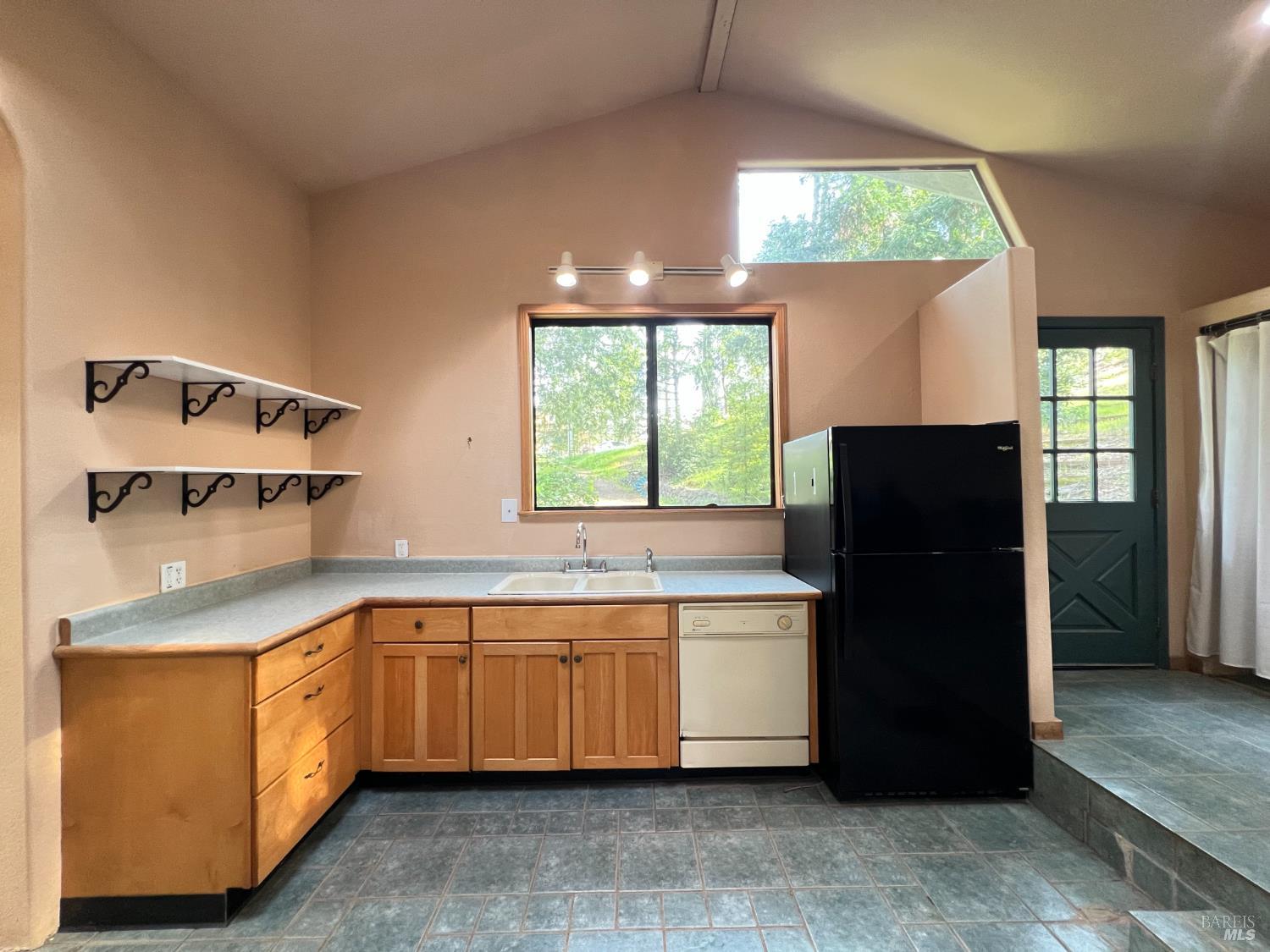 4000 Ridgewood Road Willits, CA 95490 - Photo 7 of 42 a kitchen with a sink a refrigerator and window