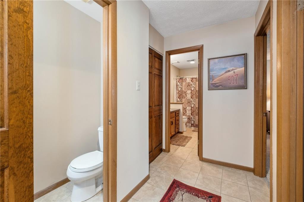 2584 Grouse Ridge, Unit A Wexford, PA 15090 - Photo 13 of 27 a view of bathroom with a toilet and a shower